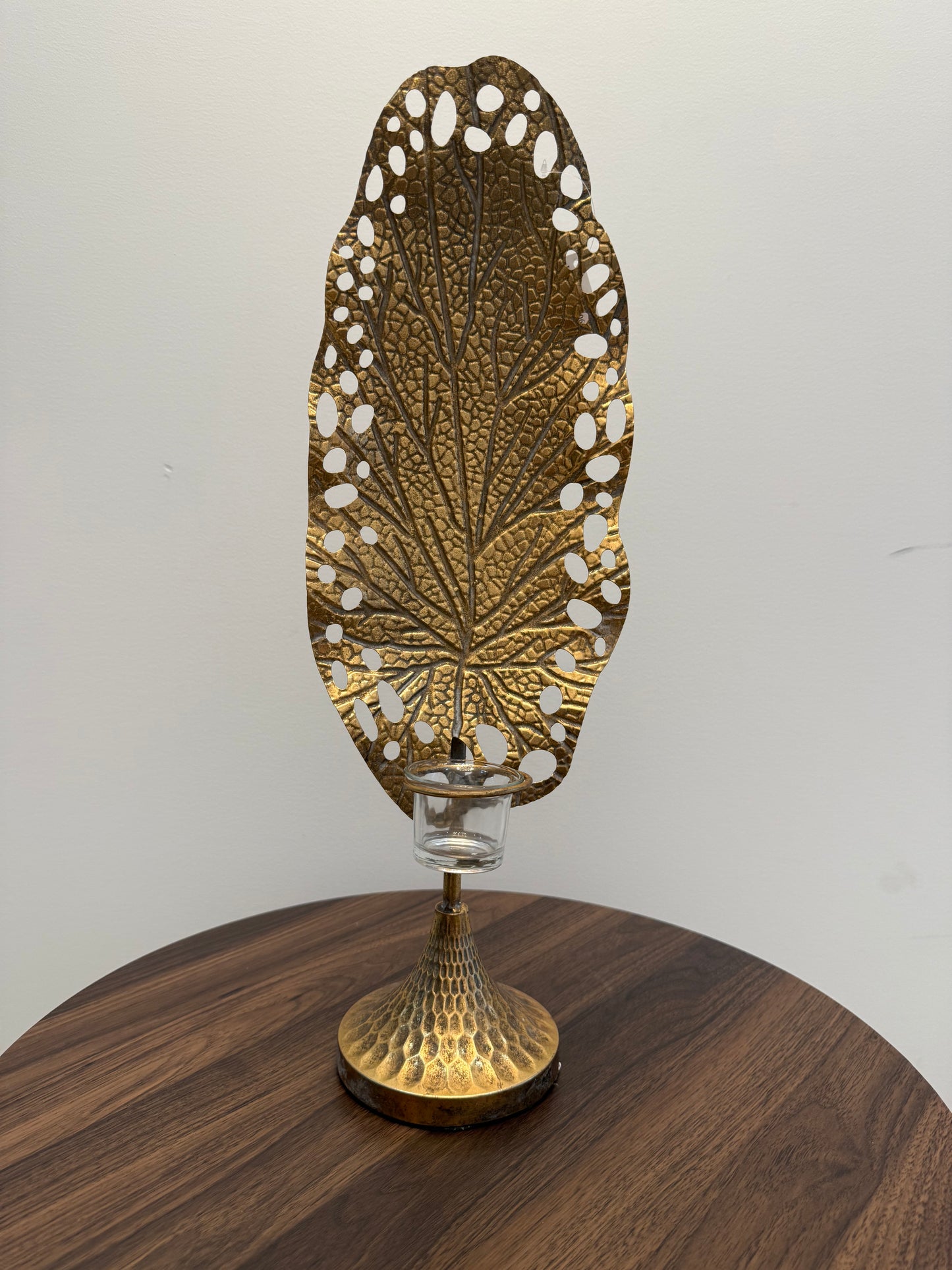 Metal leaf with glass candle holder